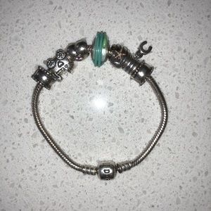 Authentic Pandora charm bracelet with 6 charms